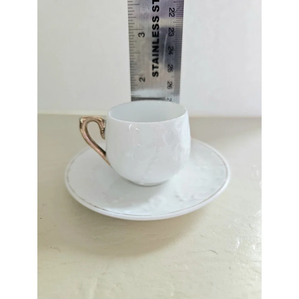 Vintage Miniature White Raised Design Cup And Saucer